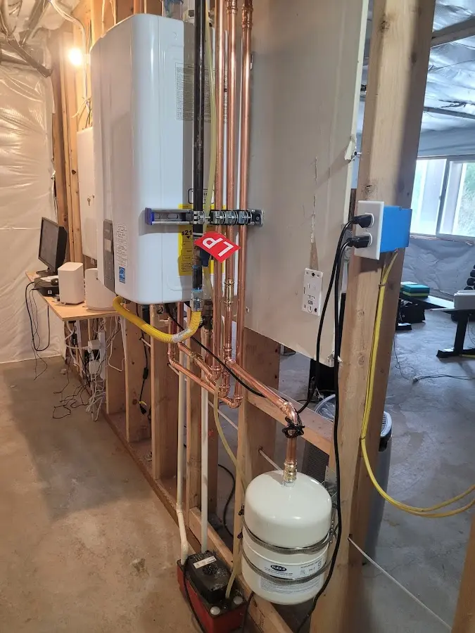 Licensed plumber repairing a kitchen sink in Clarksville
